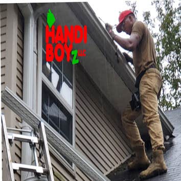 Cleaning the gutters to install Leafblaster Pro Gutter Guards