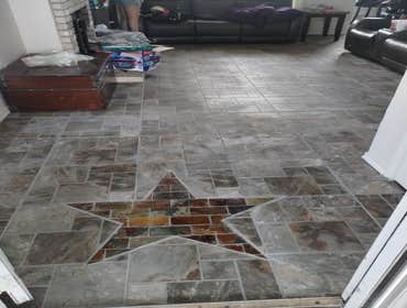 Rowlett, Texas Demo 1000 sq ft of carpet and vinyl plank floor and installation of 1000 sq ft of ceramic tile. Painted interior walls. Design and insta