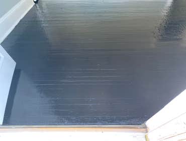 Photos by Flaugh's Construction and Design #2 Black floor stain with polyurethane topcoat