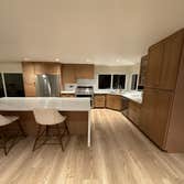 Photos by Dreamhome Buliders and Renvoations Inc #1 We completely transformed the old kitchen by installing custom white oak kitchen cabinets, a new co