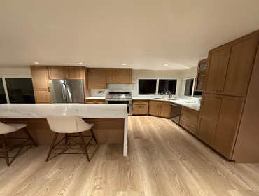 Photos by Dreamhome Buliders and Renvoations Inc #1 We completely transformed the old kitchen by installing custom white oak kitchen cabinets, a new co