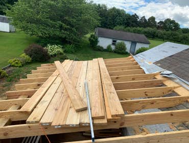 Photos by C.S Remodeling & Construction #1 Dust protection and entry to home protection temporary wall built to prevent anyone or anything from getting