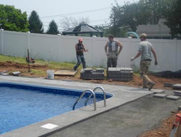 Photos by Dunn Landscape Construction #1 After initial pool installation provide all hardscape including retaining walls, pool deck, walkways and plant