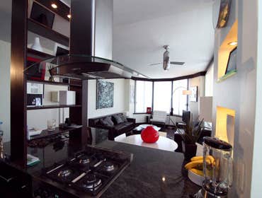 Kitchen and Livingroom remodl by Elite Architectural Remodeling Co Complete remodel with custom cabinets, shelves, doors. All woodwork designed and cre