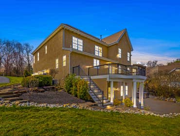 Photos by Iron Ridge Contracting LLC #3 Complete deck replacement with custom upgrades, including in-person design consultation, 3D renderings, and ful