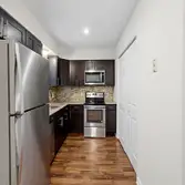 Photos by Swj Builders LLC #1 This full home renovation included a complete kitchen and bathroom remodel, new flooring throughout the house, interior p