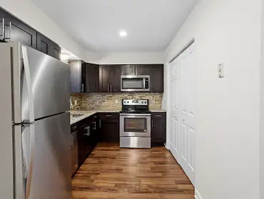 Photos by Swj Builders LLC #1 This full home renovation included a complete kitchen and bathroom remodel, new flooring throughout the house, interior p