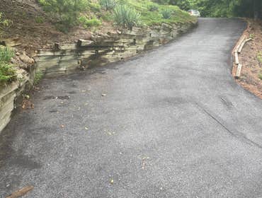 Photos by Prestige Costruction and Renovations Corp #20 Replaced Wood retaining wall with, Natural Boulders.