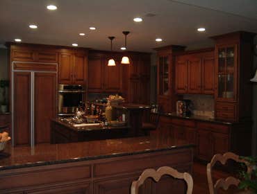 Stained Glazed Cherry Custom Kitchen With Maple Interiors Floor Plan change with Bearing Wall Removal and 100 Lineal ft. Stained Glazed Cherry Custom K