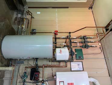 Photos by Stellitano Heating and Air Conditioning, Inc #28 Triangle Tube Boiler Solo - wall unit