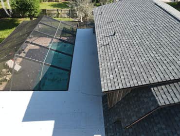 Photos by Tactical Construction Group LLC #1 Remove and reinstall a new shingle roof, tapered flat roof, and demo solar pool heaters and solar water he