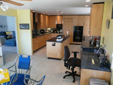 2004: Timeless Maple & Black Hub Kitchen The task here was to remodel the kitchen in such a way that it became the hub of this family’s active lifestyl