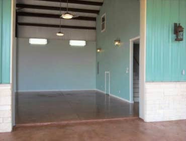 Barndominium This is a beautiful 30x60 with a 15x60 covered patio. Stained floors inside and out. Has 1 bedroom and 2 bathrooms downstairs with a kitc
