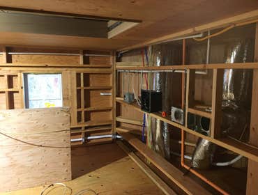 Photos by All Weather Heating and Air Conditioning Two complete HVAC systems including ducting, to be installed in two phases; pictures shown are from 