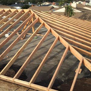 Photos by Pyramid Builders #1 new addition/ with new roof with attic