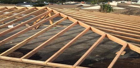 Photos by Pyramid Builders #1 new addition/ with new roof with attic