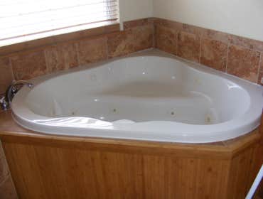 large tub wraped with bamboo