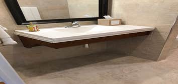 Space saving accessible bathroom