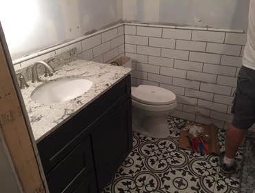 vanity and toilet installed