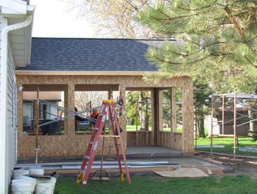Photos by Banning Construction Inc #4 Sunroom addition with knotty pine interior.