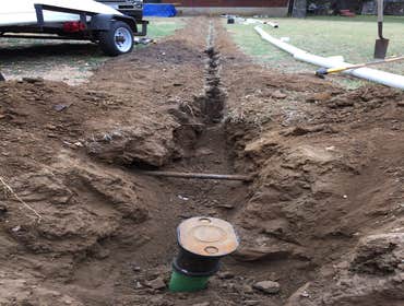 sewage line Trenches and layed 100' of 4" sewage line from house to city. Added 3 clean outs with access covers.