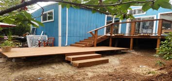 Photos by Davis Construction LLC- New deck Tear out and dispose of old decking that was a safety hazard. Install all new support structure and decking 