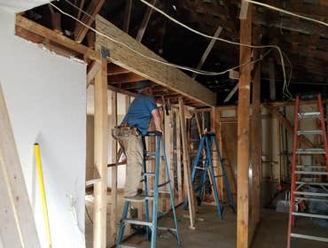 Photos by Neos Construction #12 Install new header at Kitchen for open concept kitchen, frame new ceiling and walls and island.