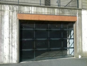 Garage entry repair Replaced exterior rotting trim surrounding apartment garage entry