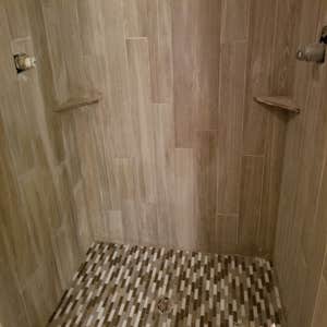 Candice's Bad shower..NOT This is in response to the last review! This beautiful shower details were, A sloped mud pan. 6" by 36" Vertically...