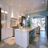 A "Convertible" Interior Inside this wonderful home the open design of kitchen/dining/family area allows for great entertaining, yet is a comfortable s