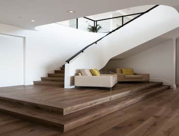 Tiburon house Install hardwood flooring throughout house - wide plank white oak with cured urethane finish