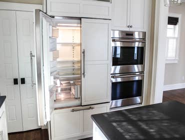 Baine Contracting Inc Project Multiple jobsites - showing kitchens, interior and exterior trim work, new homes, bathrooms, tile work, wood and iron ra