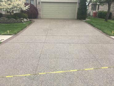exposed aggregate Driveway Photo by Potoroka Concrete Macomb MI