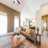 Chandler Custom Home This is a Gorgeous 6 bed 5.5 bath Family home or an Entertainers Dream, enjoy some of the many features, Horse Property, Wine Cell