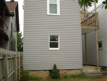 Swank Home Makeover A 2.5 story, single-family home: Siding, windows, insullation, soffit, fascia, capping. Also, repaired fence damage, installed new