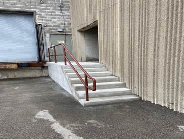Photos by Nest Design & Builders LLC #1 New concrete steps and handrails for commercial property / shopping center