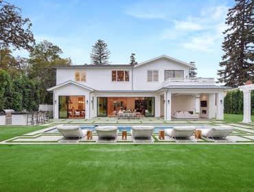 Bundy Drive Los Angeles This newly completed Brentwood home seamlessly merges East Coast sophistication with California flair. Set on a rare half-acre 