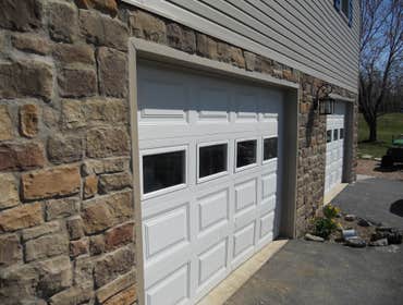 Two Car Garage with Rock Venee