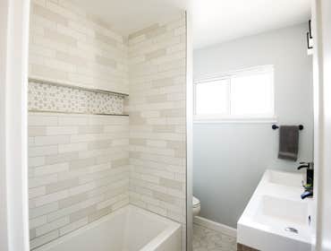 South Bay Bathroom Complete bathroom remodel with all new fixtures and finishes.