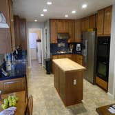 Photos by ZV Construction #2 Complete kitchen and laundry remodel,
Including flooring in mail living areas.
Before and after kitchen pictures.
