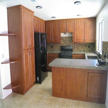 Burbank kitchen cabinet reface This is a straight forward reface done in "Summer flame" color with classic (JP7) arched upper doors, and (JR7) lower do