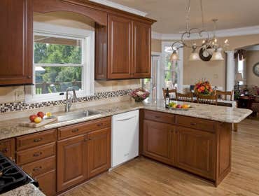 Kitchen Cabinet Refacing View our project portfolio to see our high-quality kitchen cabinet refacing restorations.