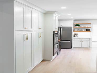 Photos by Albrecht, LLC #1 Through strategic space planning, thoughtful material selections, and custom craftsmanship, this first-floor renovation tran