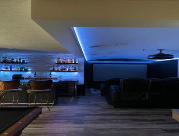 Photos by Precision Construction #3 Basement finish with bar and media area