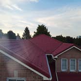 Completed Metal Roofing System with Improved Drainage
