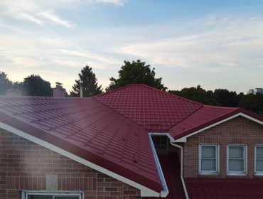 Completed Metal Roofing System with Improved Drainage