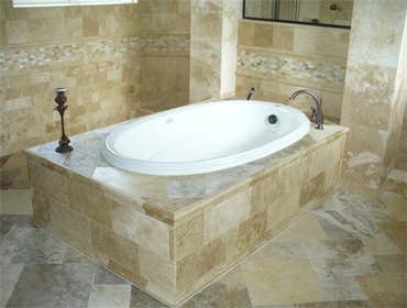 Custom travertine masterbath
