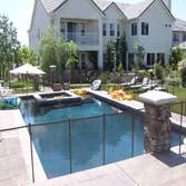 Photo(s) from CUSTOM DERIAN POOLS Infinity Pools, Hillside Pools, Landscaping, BBQs, Outdoor Fireplaces, Shade structures, Pergolas, Landscaping, Mason