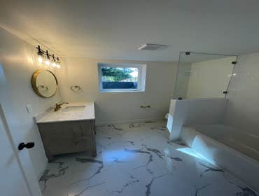 Photos by Express Restoration LLC #1 Remodeled all bathrooms, kitchen.