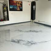 Photos by V2 Construction & Remodel #4 Garage transformed with an all new Resin Floor! Really is just a fascinating look.